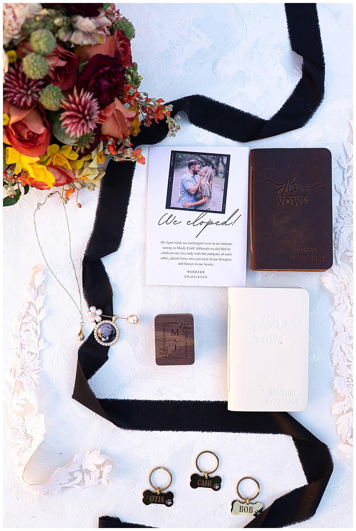 image of a wedding invitation and wedding florals with vow book