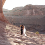 Moab elopement of the arches at sunrise