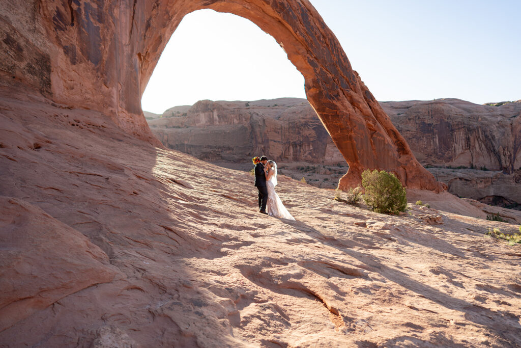 Moab elopement of the arches at sunrise