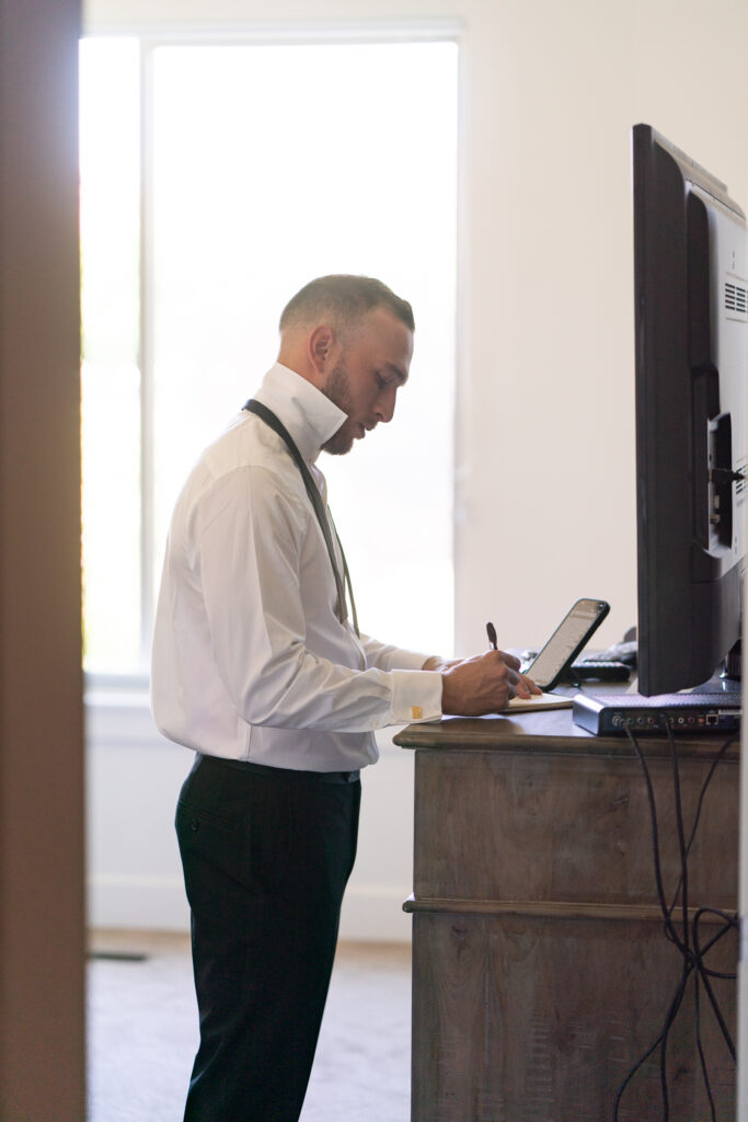 Groom getting ready at Element Hotel —before Canyonlands ceremony.