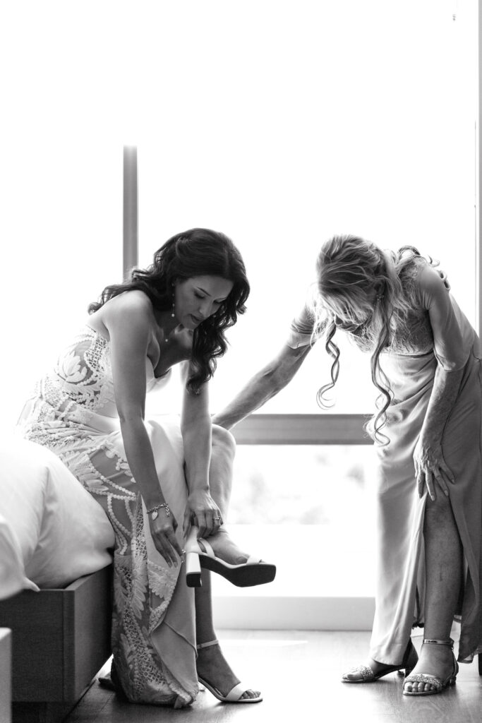 Bride getting ready at Element Hotel — Bride having final hair and makeup touches before Canyonlands ceremony.