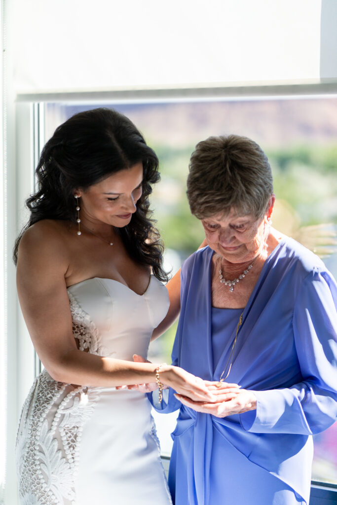 Bride getting ready at Element Hotel — Bride having final hair and makeup touches before Canyonlands ceremony.