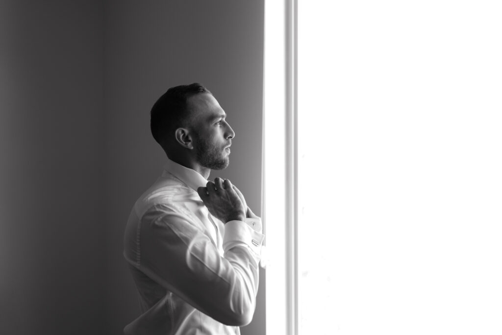 Groom getting ready at Element Hotel —before Canyonlands ceremony.