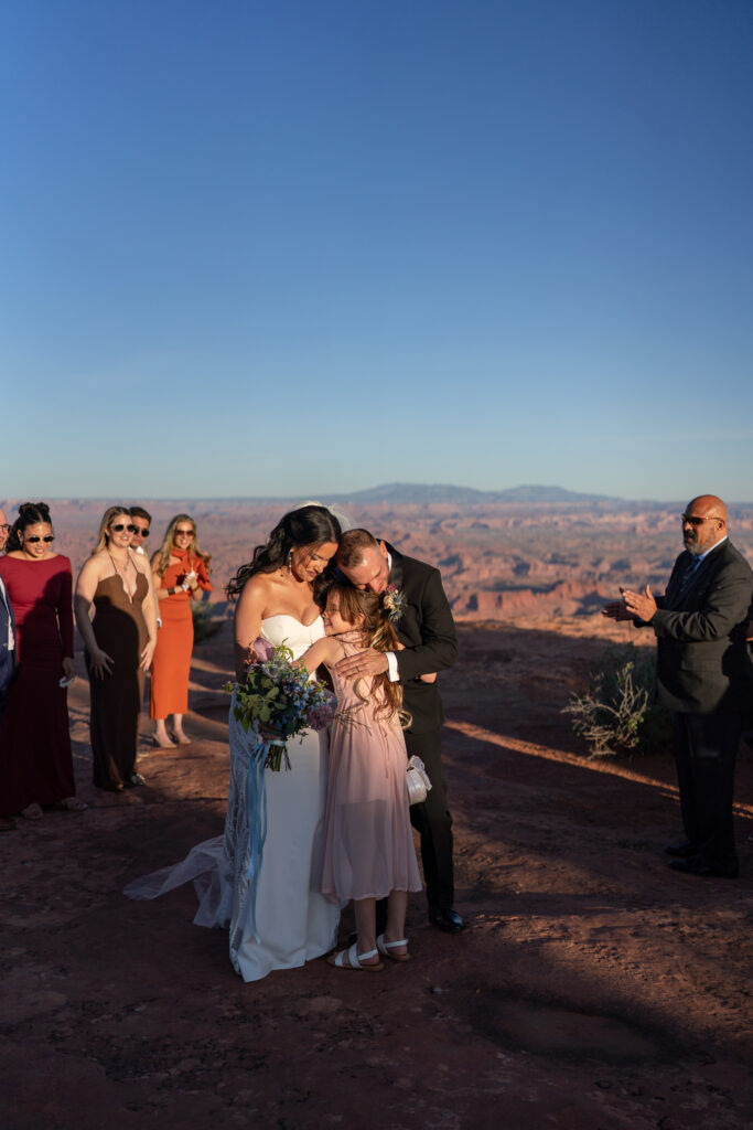 Ceremony at overlook in Canyonlands National Park — Sunset vows with canyon backdrop and bilingual officiant.