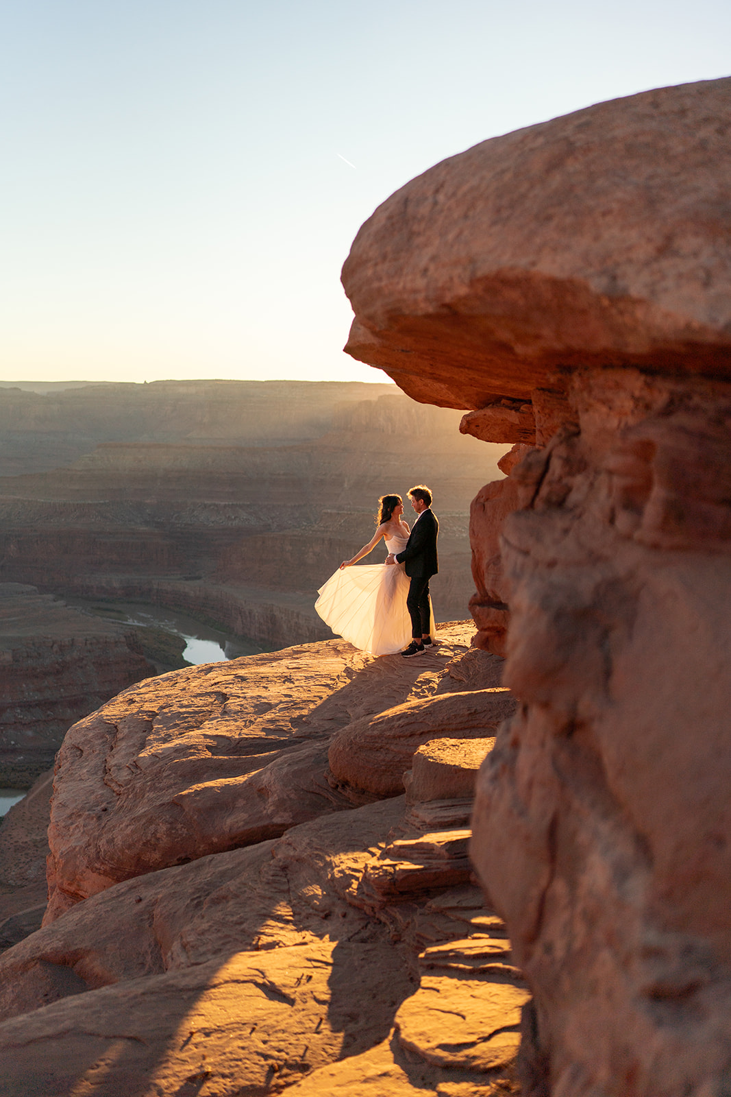 Moab elopement at sunrise with red rock canyons
